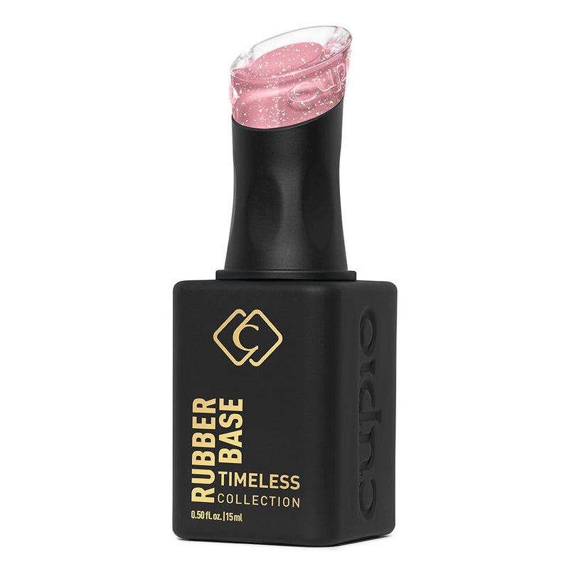 Rubber Base Posh Glow – beholder set fra siden, en fleksibel og holdbar rubber base i lyserød farve med flot glimmereffekt, perfekt til negleforstærkning og nail art